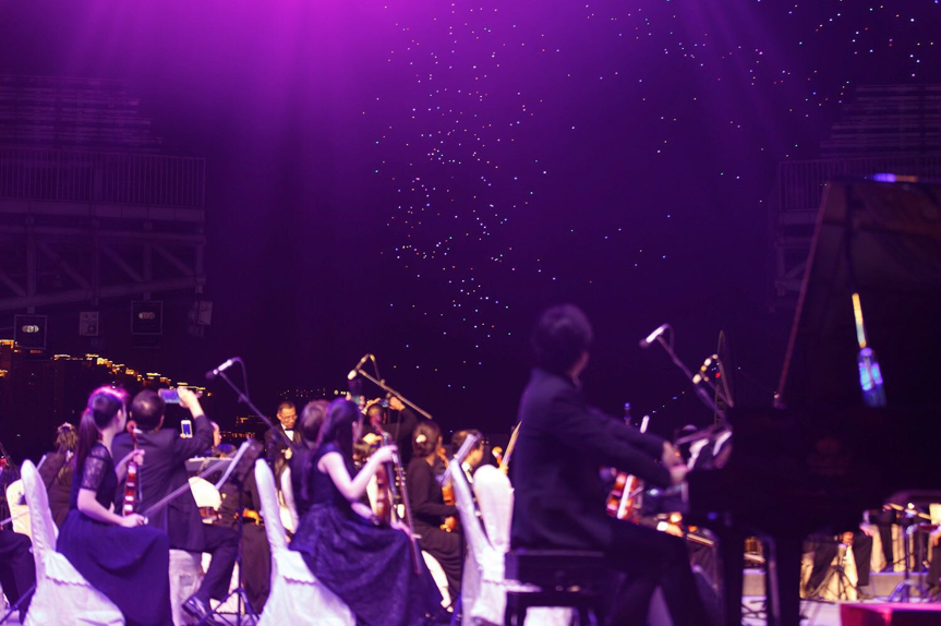 The Guangzhou Symphony Orchestra and the UAV formation performing simultaneously